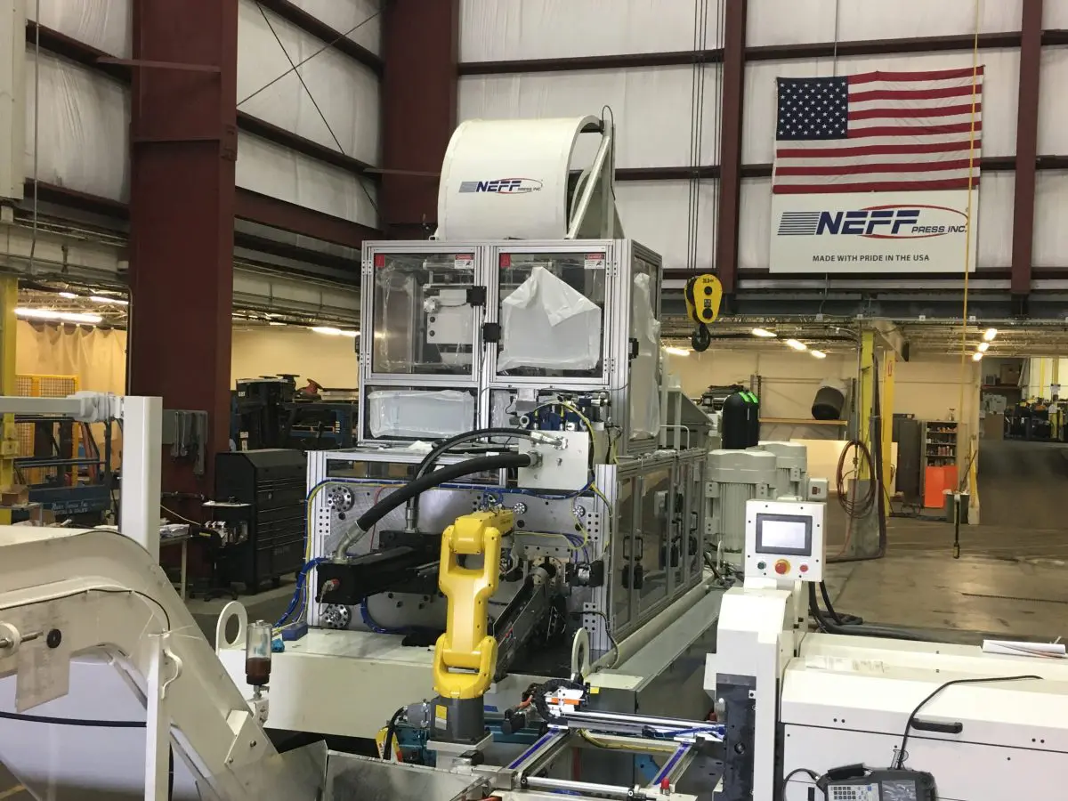 Edit-1-1200x900 A machine in an industrial setting with american flag.