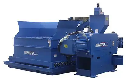 p4 A blue machine is sitting next to a wall.