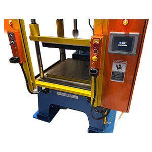Neff Press heated platen option installed on hydraulic press with yellow safety guards and digital temperature control