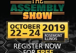 A black and yellow logo for the assembly show.